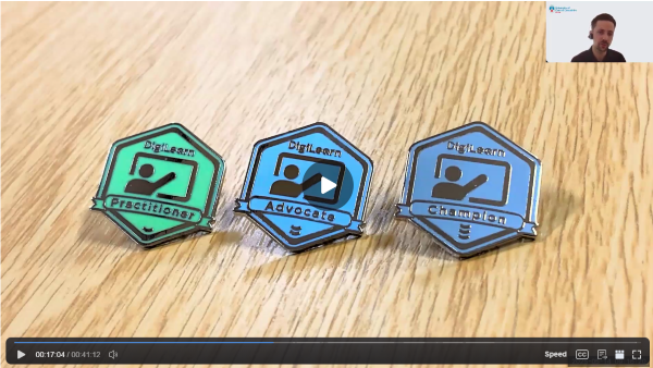 The selection of Digilearn badges laid on table, practioner, advocate and champion